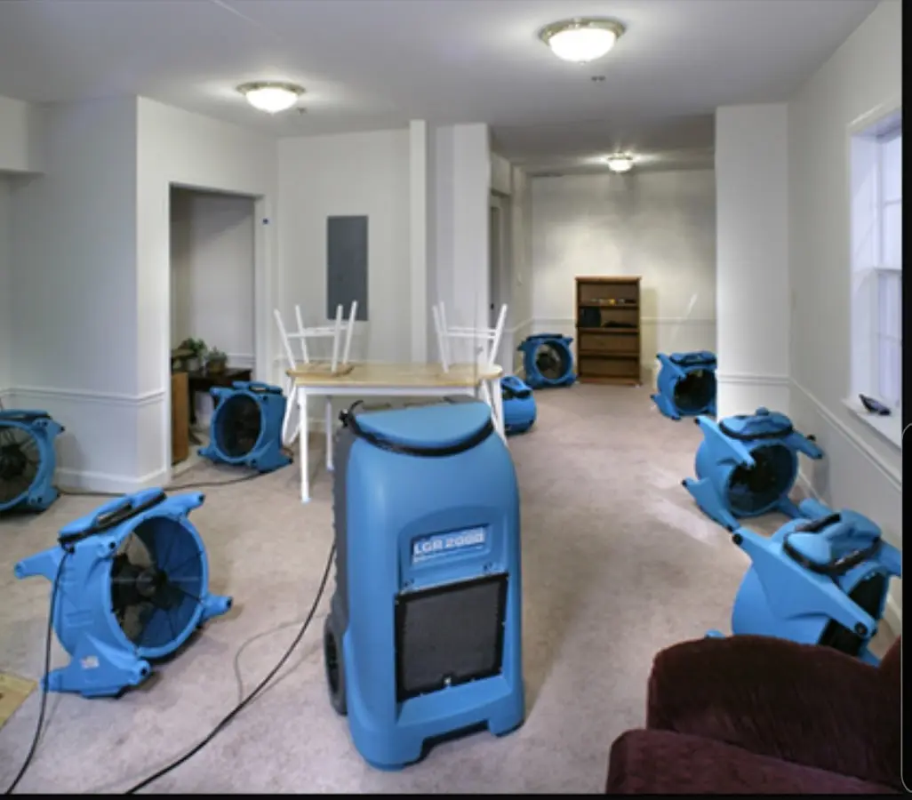Air movers and dehumidifier setup for Water Damage Restoration in Lackawanna